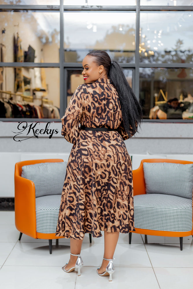 Bold in animal print midi dress