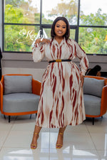 "A luxurious babe in print' midi dress