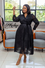 Exquisite in black midi dress