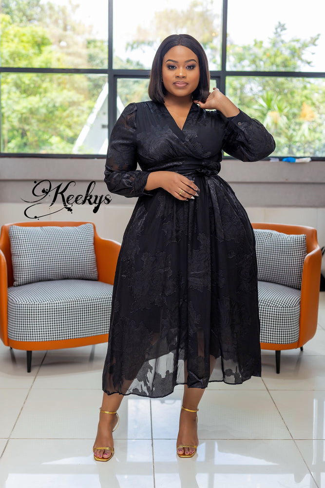 Exquisite in black midi dress