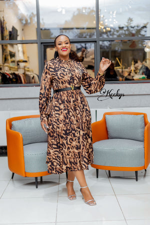 Bold in animal print midi dress